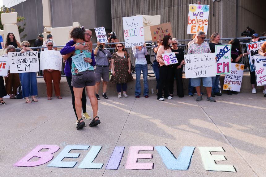 Supporters for 'E.M' gather outside a London Courthouse, in London, Ontario, Canada on July 24, 2025.