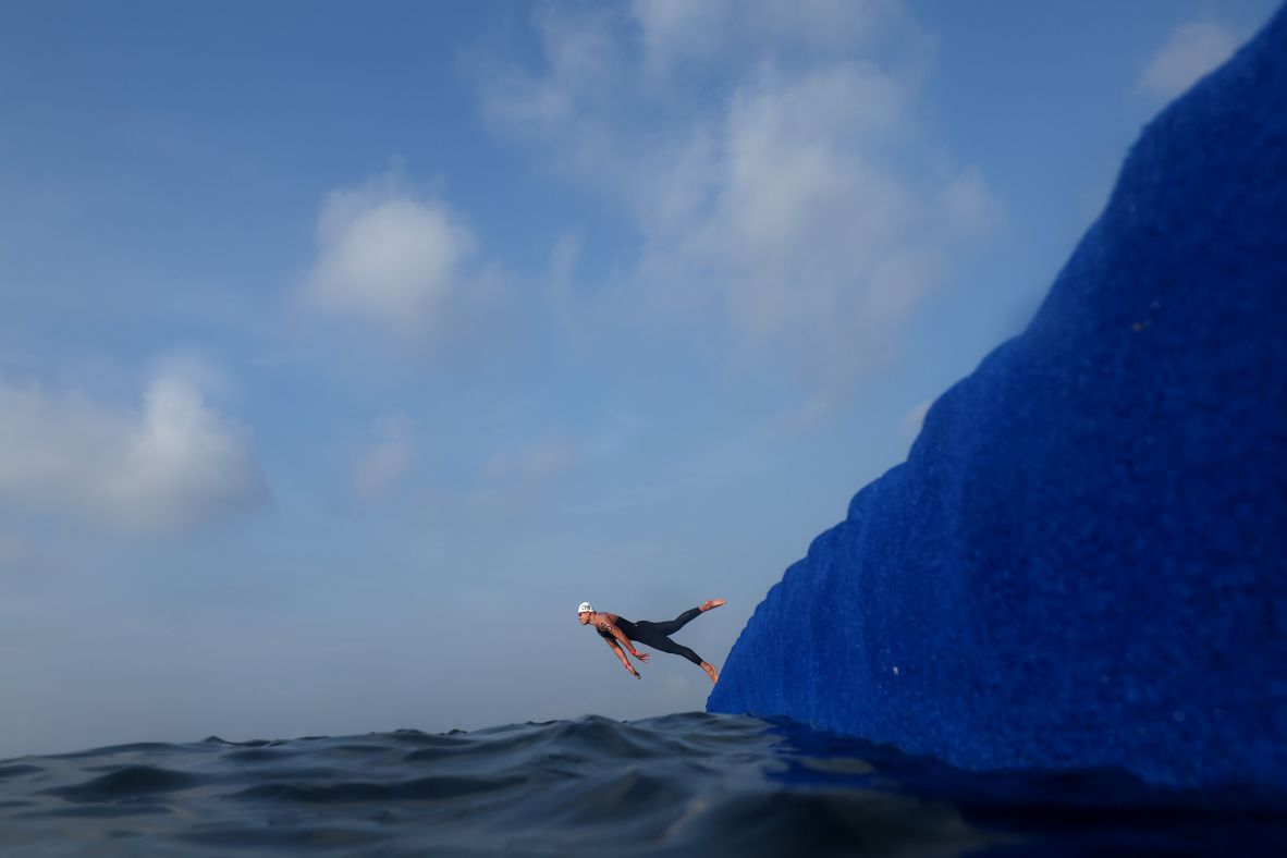 Chinese swimmer Tianchen Lan competes in an open-water relay race at the World Aquatics Championships in Singapore on Sunday, July 20.