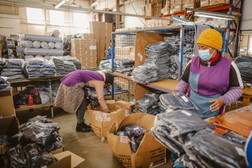 Workers box finished jeans ready for shipping at the Afri-Expo Textiles Ltd. denim factory in Maseru, Lesotho, on Thursday, July 24, 2025.