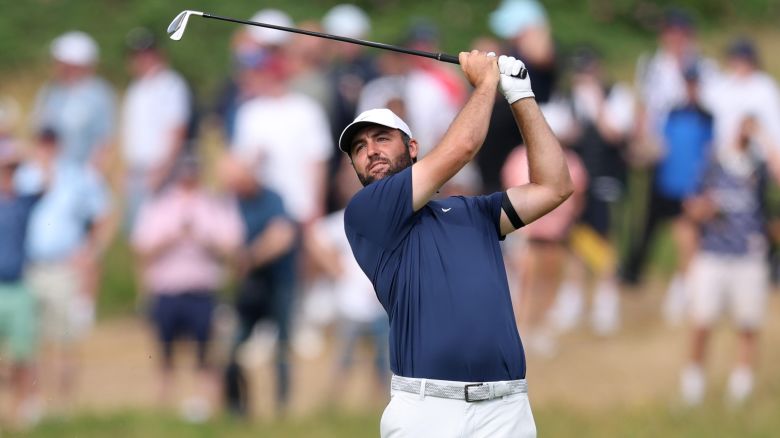 Scottie Scheffler of the United States plays his second shot on the 12th hole during day four of The 153rd Open Championship at Royal Portrush Golf Club on July 20, 2025 in Portrush, Northern Ireland.
