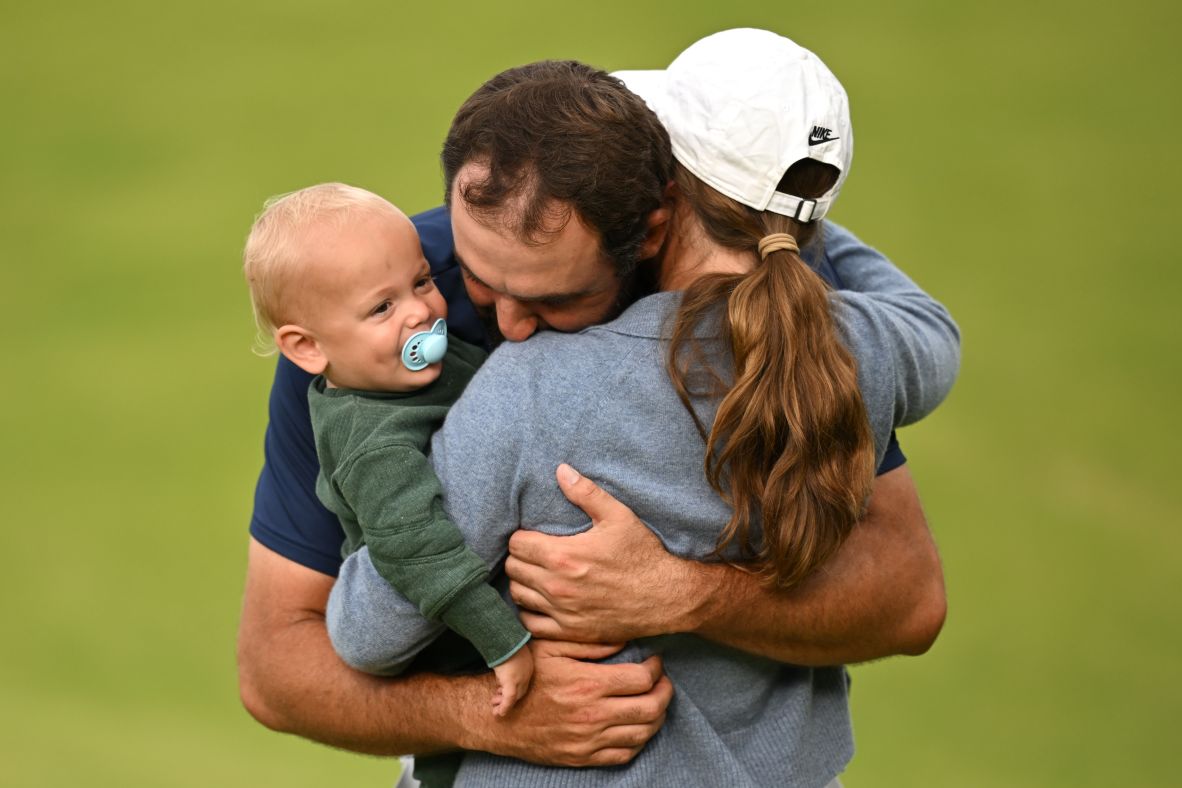 Scottie Scheffler hugs his wife, Meredith, and their son, Bennett, after <a  target="_top" href="/newspapers?url=https://www.cnn.com/2025/07/20/sport/scottie-scheffler-wins-the-open-spt">he won the Open Championship</a> in Portrush, Northern Ireland, on Sunday, July 20. It’s the fourth major title for Scheffler, the world’s top-ranked player who also won the PGA Championship earlier this season.