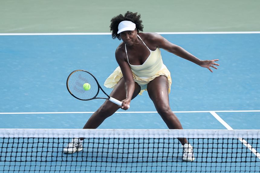 Williams returns a shot during a women's doubles match with Hailey Baptiste (not pictured) against Eugenie Bouchard and Cleave Ngounoue on day 1 of the Mubadala Citi DC Open on July 21.