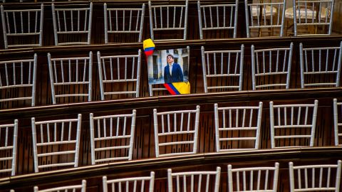 A picture of Colombian senator Miguel Uribe Turbay is placed during the instalment of the 2025-2026 session period of the Colombian Congress, on July 20, 2025 in Bogota, Colombia.