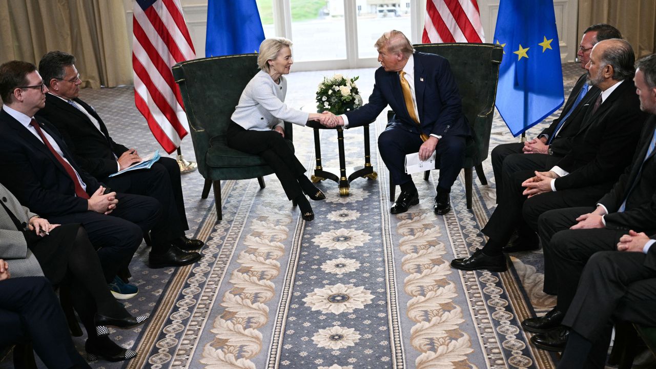 TOPSHOT - US President Donald Trump (R) shakes hands with European Commission President Ursula von der Leyen (L) after agreeing on a trade deal between the two economies following their meeting, in Turnberry south west Scotland on July 27, 2025, on the third day of his visit to the country, since his second tenure as President began. US President Donald Trump said on July 27, 2025 that he had reached a trade agreement with European Union chief Ursula von der Leyen. "We have reached a deal. It's a good deal for everybody," Trump told reporters after talks with von der Leyen at his golf resort in Turnberry, Scotland. The EU chief also hailed it as a "good deal". (Photo by Brendan SMIALOWSKI / AFP) (Photo by BRENDAN SMIALOWSKI/AFP via Getty Images)          