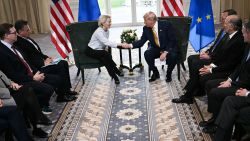 TOPSHOT - US President Donald Trump (R) shakes hands with European Commission President Ursula von der Leyen (L) after agreeing on a trade deal between the two economies following their meeting, in Turnberry south west Scotland on July 27, 2025, on the third day of his visit to the country, since his second tenure as President began. US President Donald Trump said on July 27, 2025 that he had reached a trade agreement with European Union chief Ursula von der Leyen. "We have reached a deal. It's a good deal for everybody," Trump told reporters after talks with von der Leyen at his golf resort in Turnberry, Scotland. The EU chief also hailed it as a "good deal". (Photo by Brendan SMIALOWSKI / AFP) (Photo by BRENDAN SMIALOWSKI/AFP via Getty Images)          