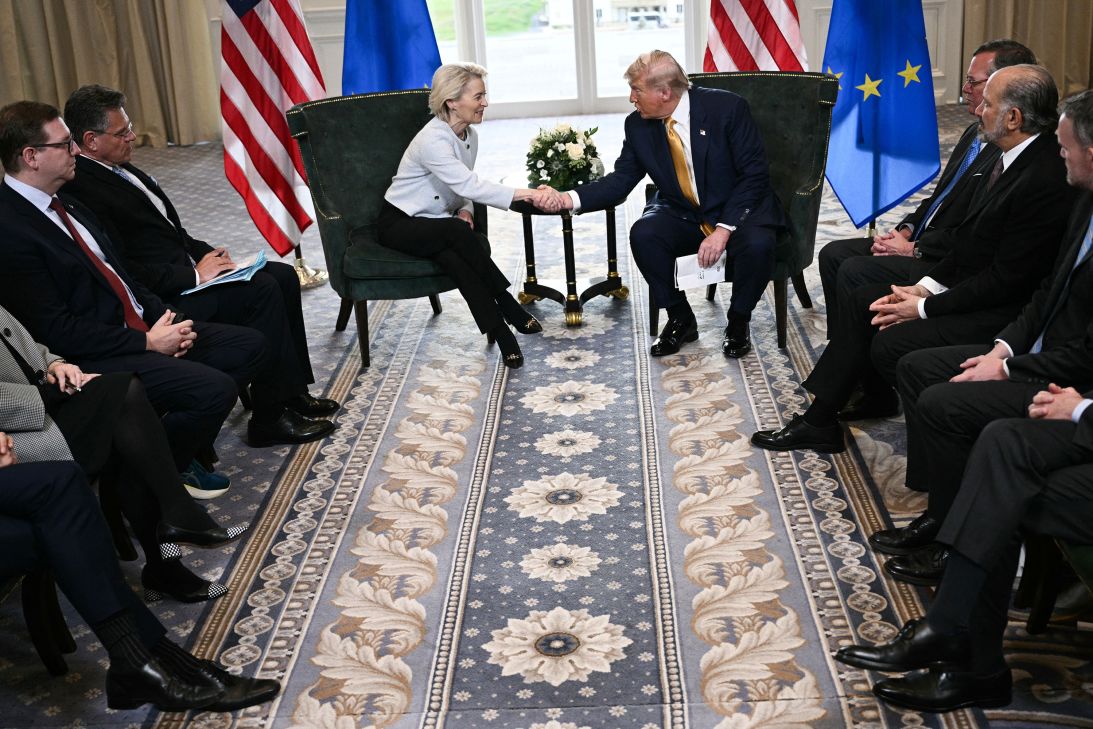 US President Donald Trump shakes hands with European Commission President Ursula von der Leyen in Turnberry, Scotland, on Sunday.
