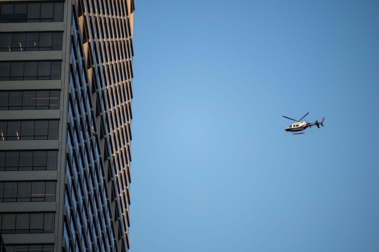 A New York Police Department helicopter near the scene of a shooting at 345 Park Ave on Monday.