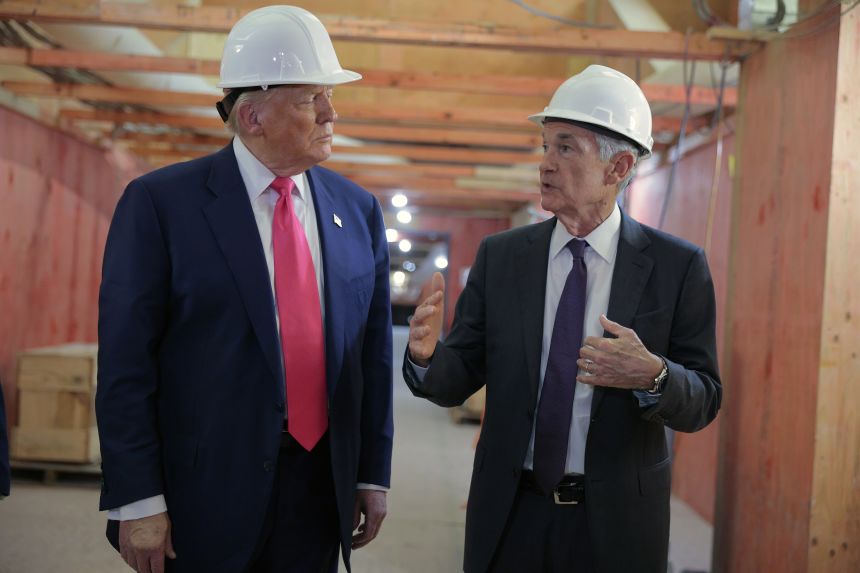 President Donald Trump and Federal Reserve Chair Jerome Powell tour the renovation at the Federal Reserve’s headquarters, on July 24.