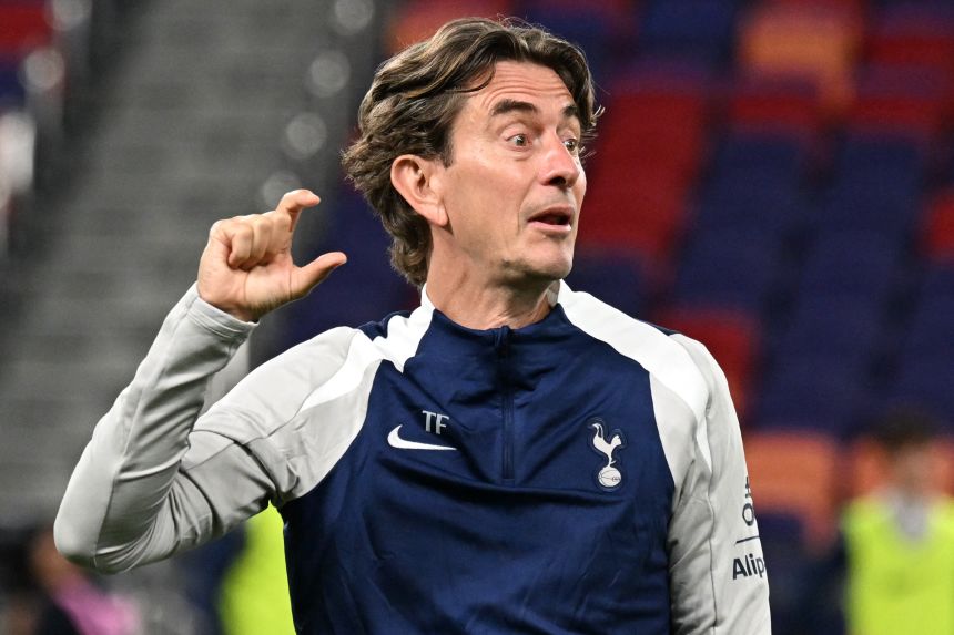 Tottenham Hotspur manager Thomas Frank, who signed with the club in June, gives instructions during a training session in Hong Kong.