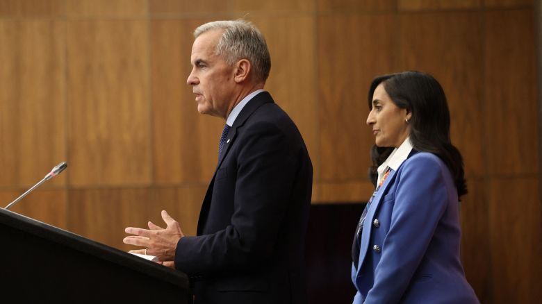 Canadian Prime Minister Mark Carney speaks, alongside Foreign Affairs Minister Anita Anand, during a press conference at the National Press Theatre in Ottawa, Ontario, Canada on Wednesday, following a Cabinet meeting.