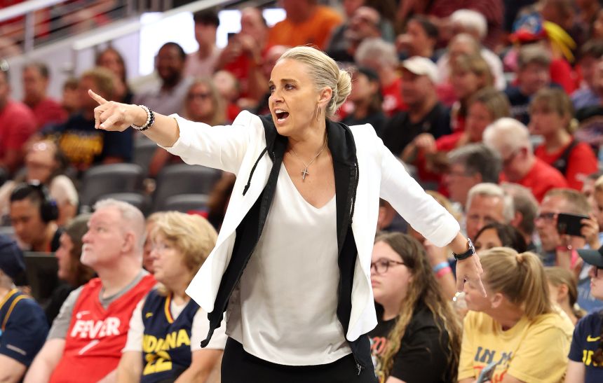 Becky Hammon gives instructions to her team on July 24.