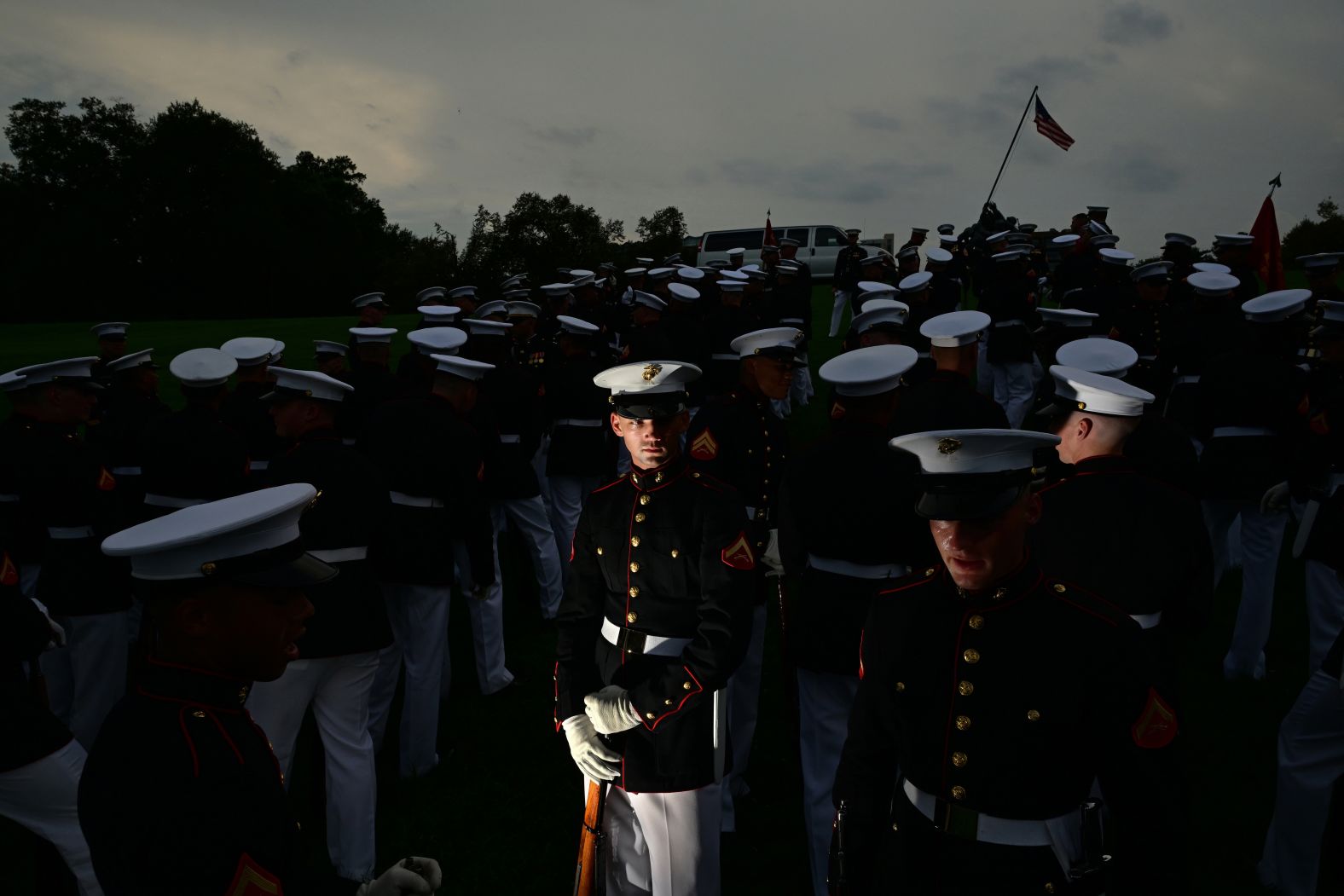 US Marines attend a weekly Sunset Parade at the US Marine Corps War Memorial in Arlington, Virginia, on Tuesday, July 29.