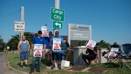 Workers picket outside the Boeing Defense facility in Berkeley, Missouri, on August 4. The workers rejected a contract offer on Friday, extending the strike that began this summer.