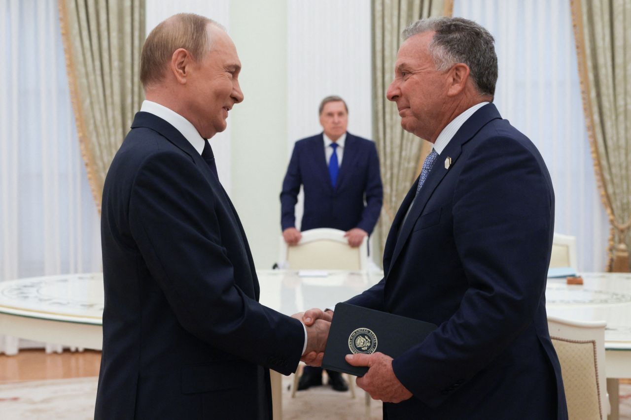 Russia's President Vladimir Putin greets US Special Envoy Steve Witkoff prior to their talks in Moscow on August 6, 2025.