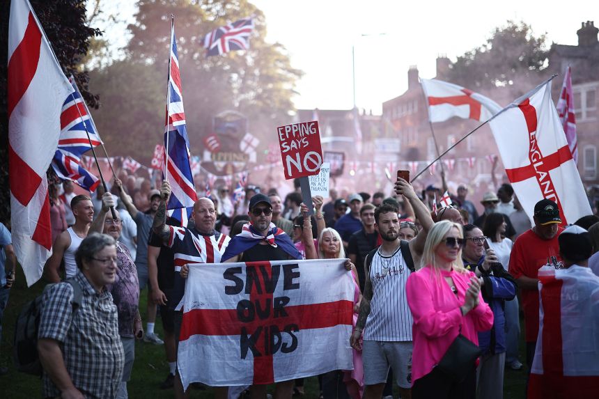 The road that runs from the town center to the Bell Hotel has, in the past two weeks, been lined with the white and red of the England St. George’s Cross flag.