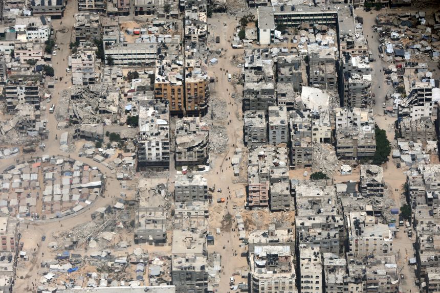 A view from the air as Jordanian air force personnel perform an air drop of aid and humanitarian supplies in Gaza on Wednesday.