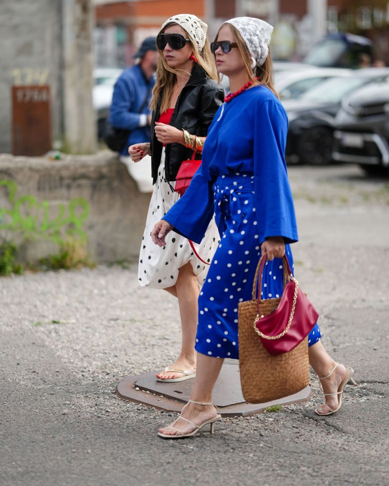 Stylish guests at Copenhagen Fashion Week in August styled their looks with polka dot prints, seen on skirts and other items of clothing.