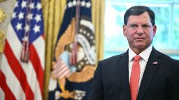 Social Security Administration Commissioner Frank Bisignano joins President Donald Trump at the White House in August. Bisignano has now been named CEO of IRS.