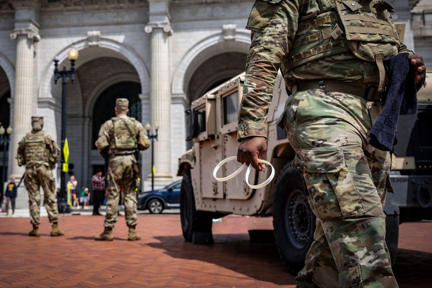 Members of the US National Guard patrol at Union Station in Washington, DC, on August 14.