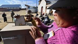 An Indigenous woman casts her vote at a polling station during the presidential election at the Kentupata community in Laja, La Paz department, Bolivia on August 17, 2025. Bolivians head to the polls Sunday for elections marked by a deep economic crisis that has seen the left implode and the right eyeing its first shot at power in 20 years. (Photo by AIZAR RALDES / AFP) (Photo by AIZAR RALDES/AFP via Getty Images)          