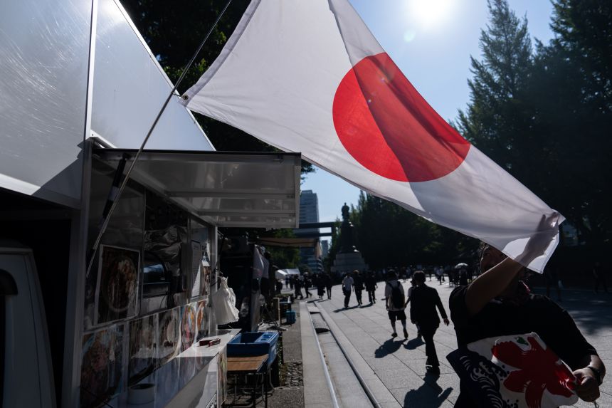 The vendor will be displaying the Japanese national flag outside the food truck at Yasukuni Shrine in Tokyo, Japan on August 15th.