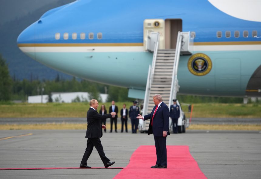 President Trump greets President Putin as he arrives at Joint Base Elmendorf-Richardson in Anchorage, Alaska, for talks on Ukraine on Friday.