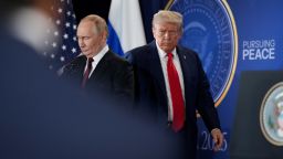 President Donald Trump (R) and Russian President Vladimir Putin arrive for a press conference at Joint Base Elmendorf-Richardson on August 15, 2025 in Anchorage, Alaska.