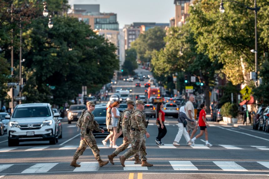 National Guard soldiers patrol 14th Street in Washington, DC, and area mostly known for entertainment and restaurants, on August 23.