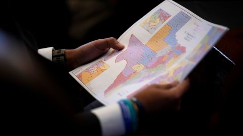 Rep. Marc LaHood, R-San Antonio, looks at a congressional redistricting map during debate of a congressional redistricting plan in the House Chamber at the Capitol in Austin, Wednesday, August 20,.