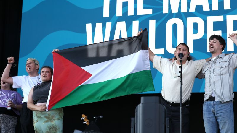 Irish folk band The Mary Wallopers say they were muted at festival for showing Palestinian flag on stage Irish folk band The Mary Wallopers say they were muted at festival for showing Palestinian flag on stage