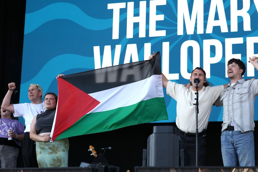 The Mary Wallopers demonstrate onstage during Day 1 of Victorious Festival on August 22, 2025 in Southsea, England.