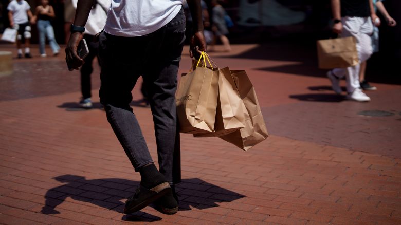 Americans continued to spend last month, partly due to Prime Day and competing sales, and back-to-school shopping.