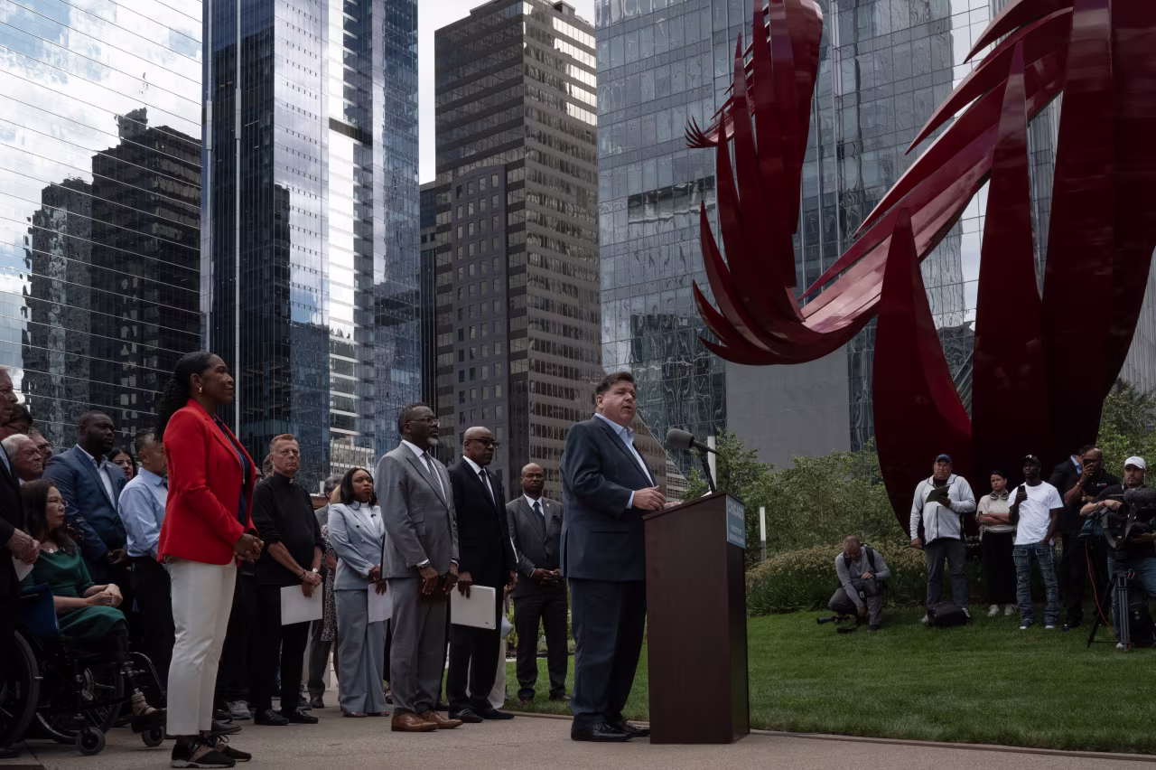 Gov. JB Pritzker speaks at a news conference with other Illinois politicians and community leaders to addressing President Donald Trump's plan to send National Guard troops into Chicago on August 25.