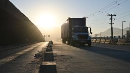 A tractor trailer arrives at the Otay Mesa Port of Entry, on the US-Mexico border in Tijuana, Baja California, Mexico, on Saturday, Aug. 30, 2025. Most of President Donald Trump's global tariffs were ruled illegal by a federal appeals court that found he exceeded his authority by imposing them through an emergency law, but the judges let the levies stay in place while the case proceeds.