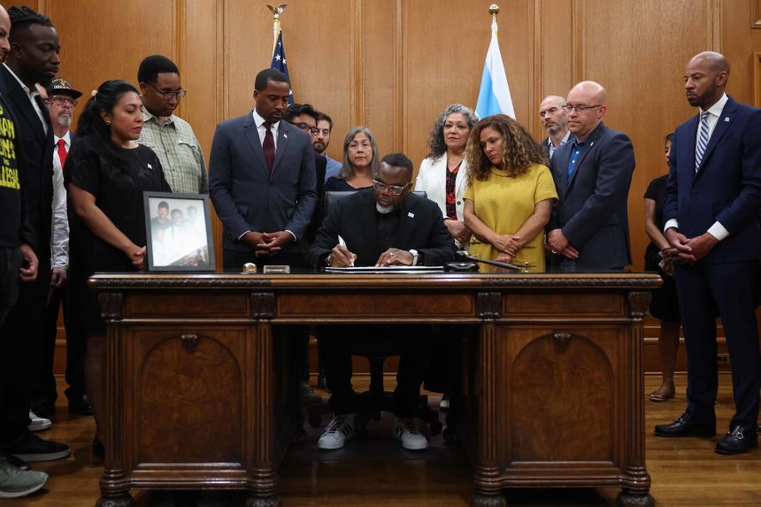 Johnson signs an executive order Saturday in response to the possible deployment of military and Department of Homeland Security personnel to Chicago.