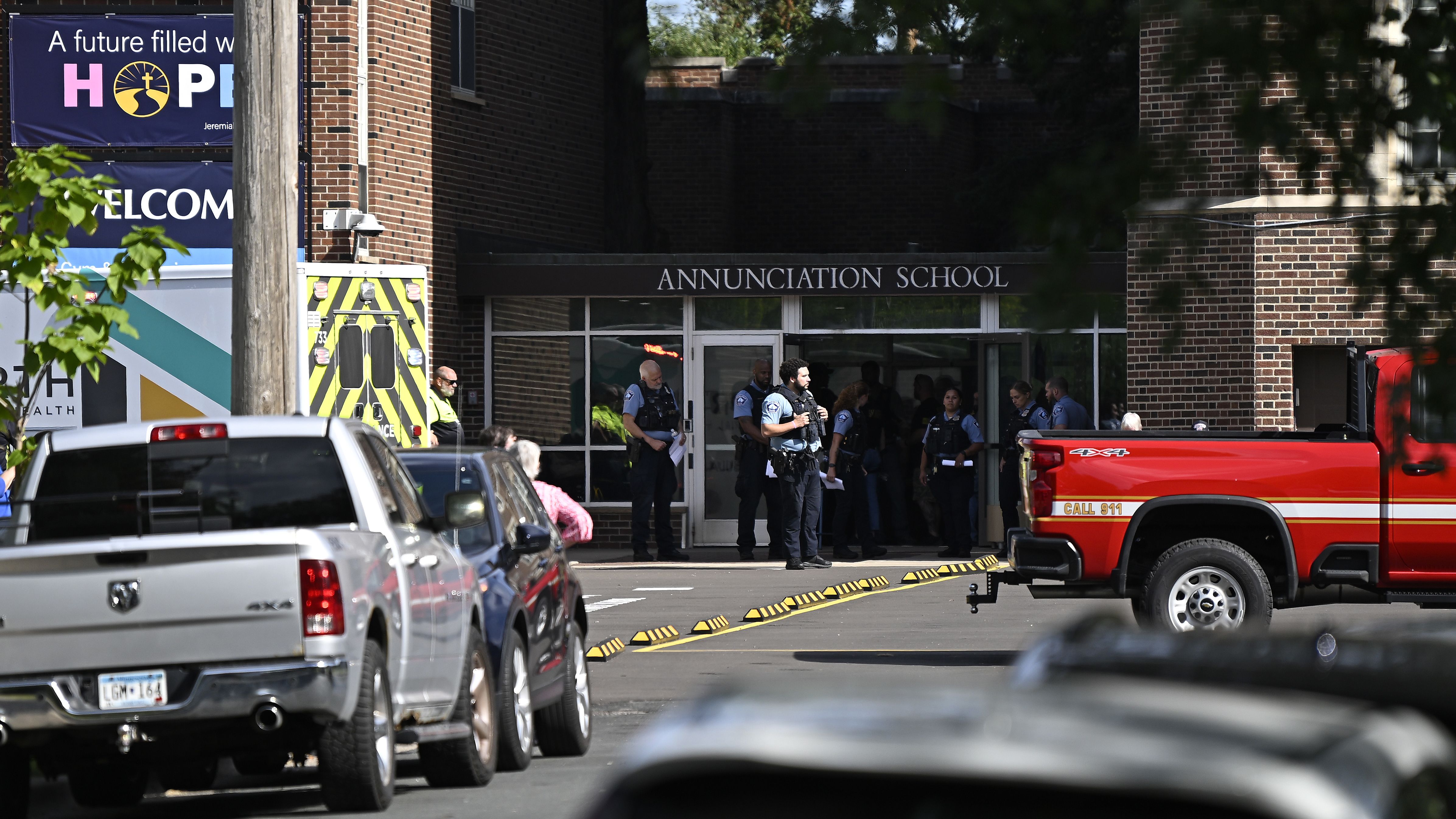 MINNEAPOLIS, MINNESOTA - AUGUST 27: Police work the scene following a mass shooting at Annunciation Catholic School on August 27, 2025 in Minneapolis, Minnesota. According to Minneapolis Police, a gunman fired through the windows of the Annunciation Church at worshippers sitting in pews during a Catholic school Mass, killing two children and injuring at least 17 others. The gunman reportedly died at the scene from a self-inflicted gunshot wound. (Photo by Stephen Maturen/Getty Images)