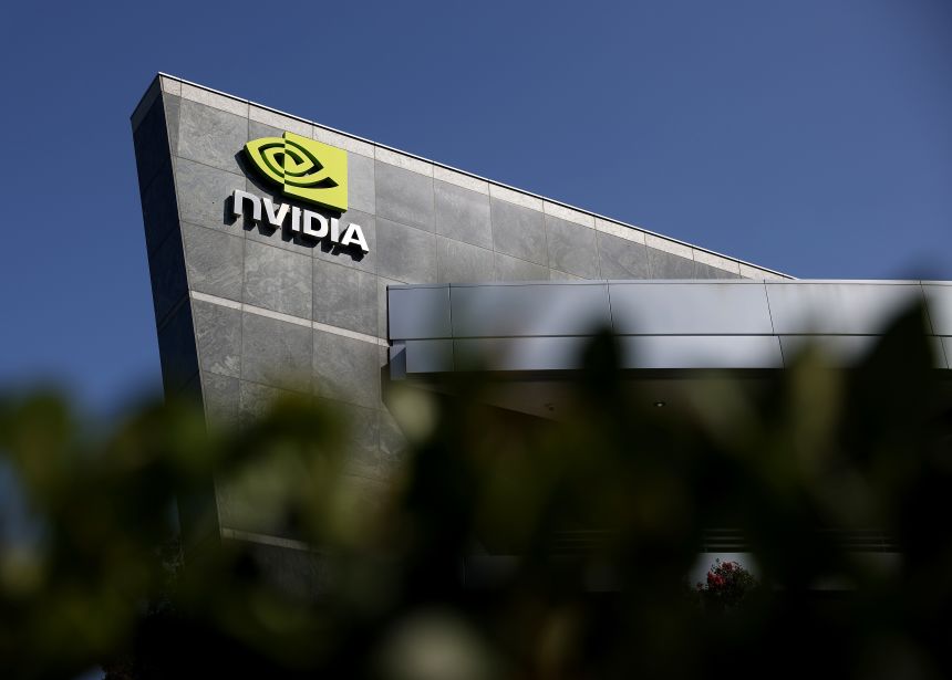 The Nvidia logo is seen on a building at Nvidia headquarters on August 27, in Santa Clara, California. The chipmaker plans to invest up to $100 billion in OpenAI.
