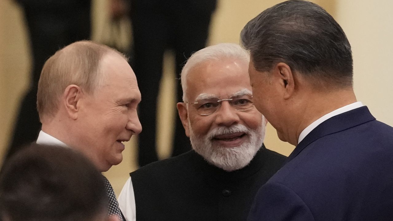 TIANJIN, CHINA - SEPTEMBER 01: Indian Prime Minister Narendra Modi talks with Russian President Vladimir Putin(L) and Chinese President Xi jinping ahead of the Shanghai Cooperation Organization (SCO) Summit 2025 at the Meijiang Convention and Exhibition Centre on September 1, 2025 in Tianjin, China. (Photo by Suo Takekuma - Pool/Getty Images)