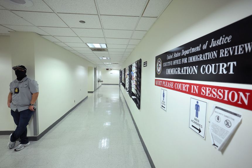  Federal agents patrol the halls of immigration court at the Jacob K. Javitz Federal Building on August 28,  in New York.