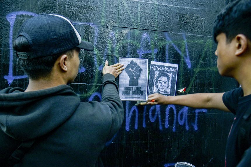 During a protest in Bandung, West Java, on September 1, protesters put up posters of Affan Kurniawan, who died after being hit by a police vehicle last Thursday.