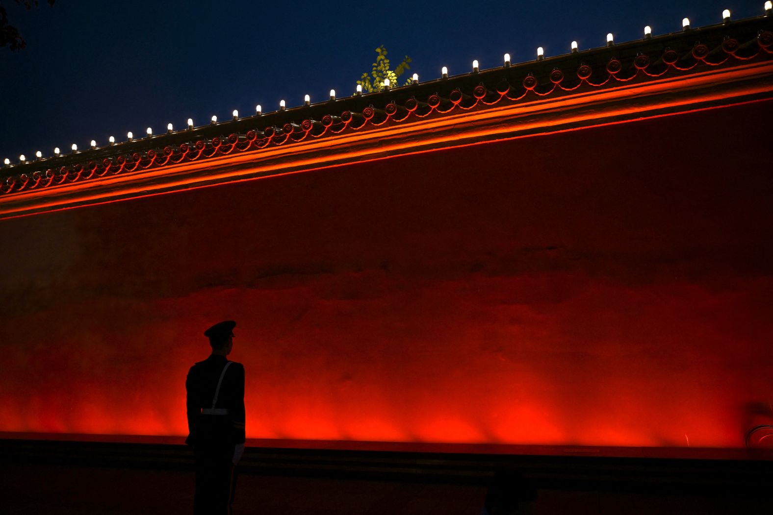 Paramilitary police stand guard ahead of Wednesday's event at Tiananmen Square.