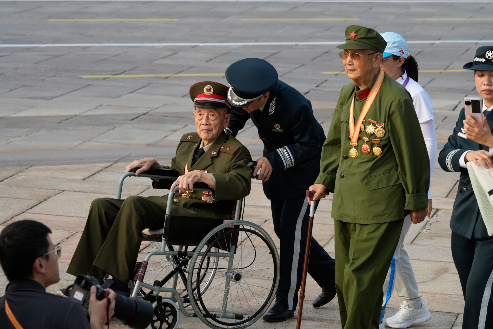 Military veterans arrive at Tiananmen Square..