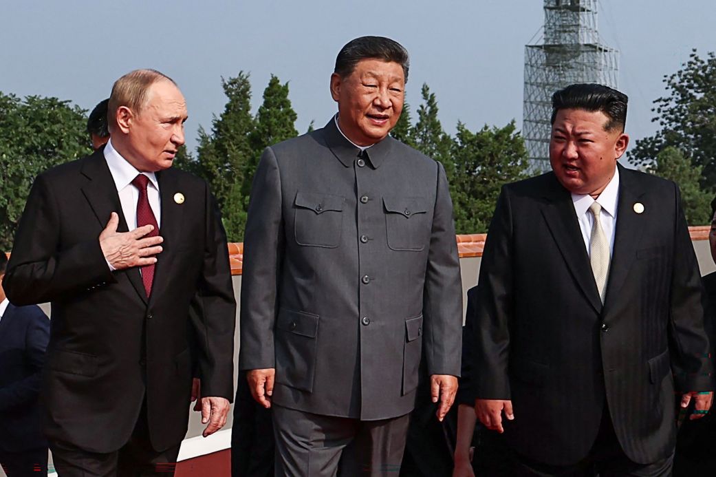 Russia's President Vladimir Putin walks with Chinese leader Xi Jinping and North Korea's leader Kim Jong Un before a military parade marking the 80th anniversary of the end of World War II in Beijing on September 3, 2025.
