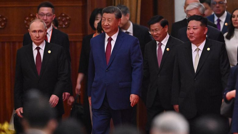 From left: Russia's President Vladimir Putin, China's President Xi Jinping and North Korea's leader Kim Jong Un arrive for a reception in the Great Hall of the People, following a military parade marking the 80th anniversary of victory over Japan and the end of World War II, in Beijing on September 3, 2025.