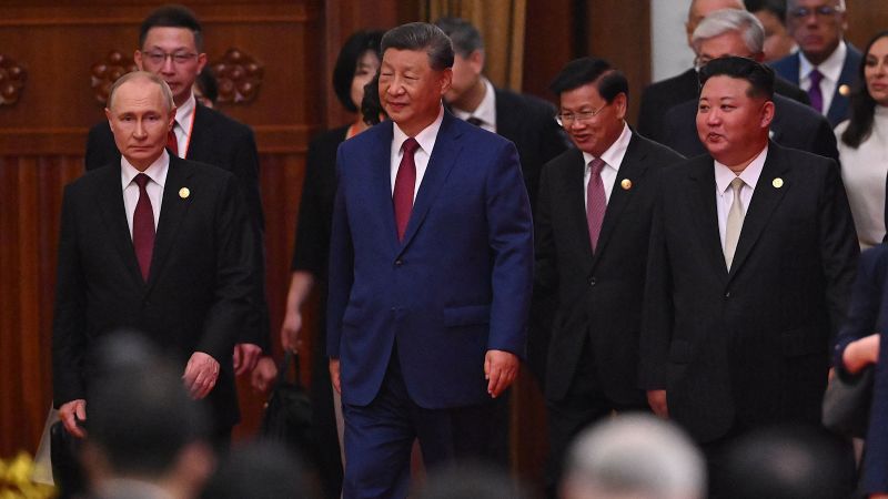 Xi Jinping, Vladimir Putin, and Kim Jong Un on Beijing red carpet