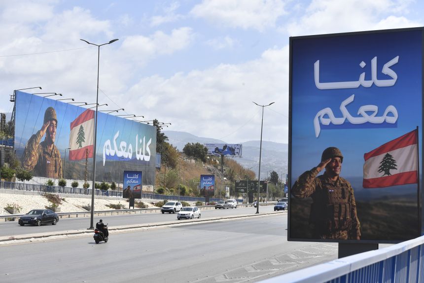 BEIRUT, LEBANON - SEPTEMBER 3: Posters expressing support for the army are hung on streets and bridges ahead of a Cabinet meeting to discuss the disarmament of Hezbollah  and the transfer of all weapons to state control, in the capital, Beirut, Lebanon on September 3, 2025. (Photo by Houssam Shbaro/Anadolu via Getty Images)