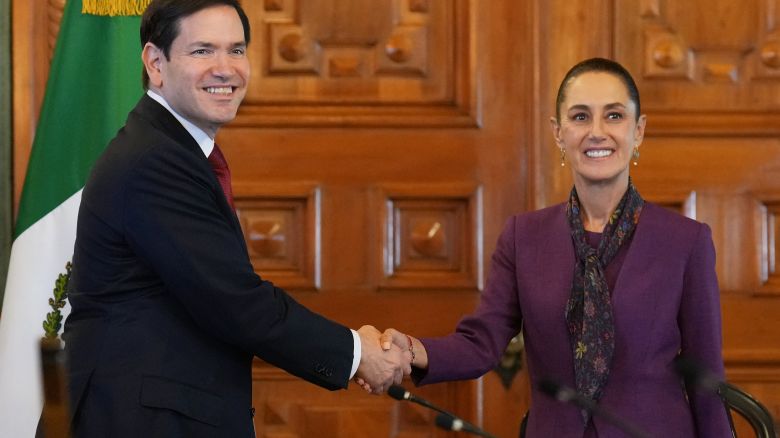 TOPSHOT - US Secretary of State Marco Rubio (L) shakes hands with Mexico's President Claudia Sheinbaum at the Palacio Nacional in Mexico City on September 3, 2025. US Secretary of State Marco Rubio meet Mexican President Claudia Sheinbaum on September 3, 2025, a day after US dramatically escalated pressure on cartels with what it said was a targeted strike near Venezuela. (Photo by Jacquelyn Martin / POOL / AFP) (Photo by JACQUELYN MARTIN/POOL/AFP via Getty Images)          