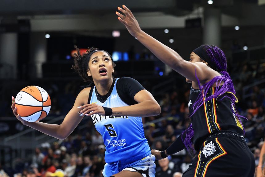 Reese attempts to shoot over Aaliyah Edwards of the Connecticut Sun in the first half at Wintrust Arena on September 3 in Chicago.