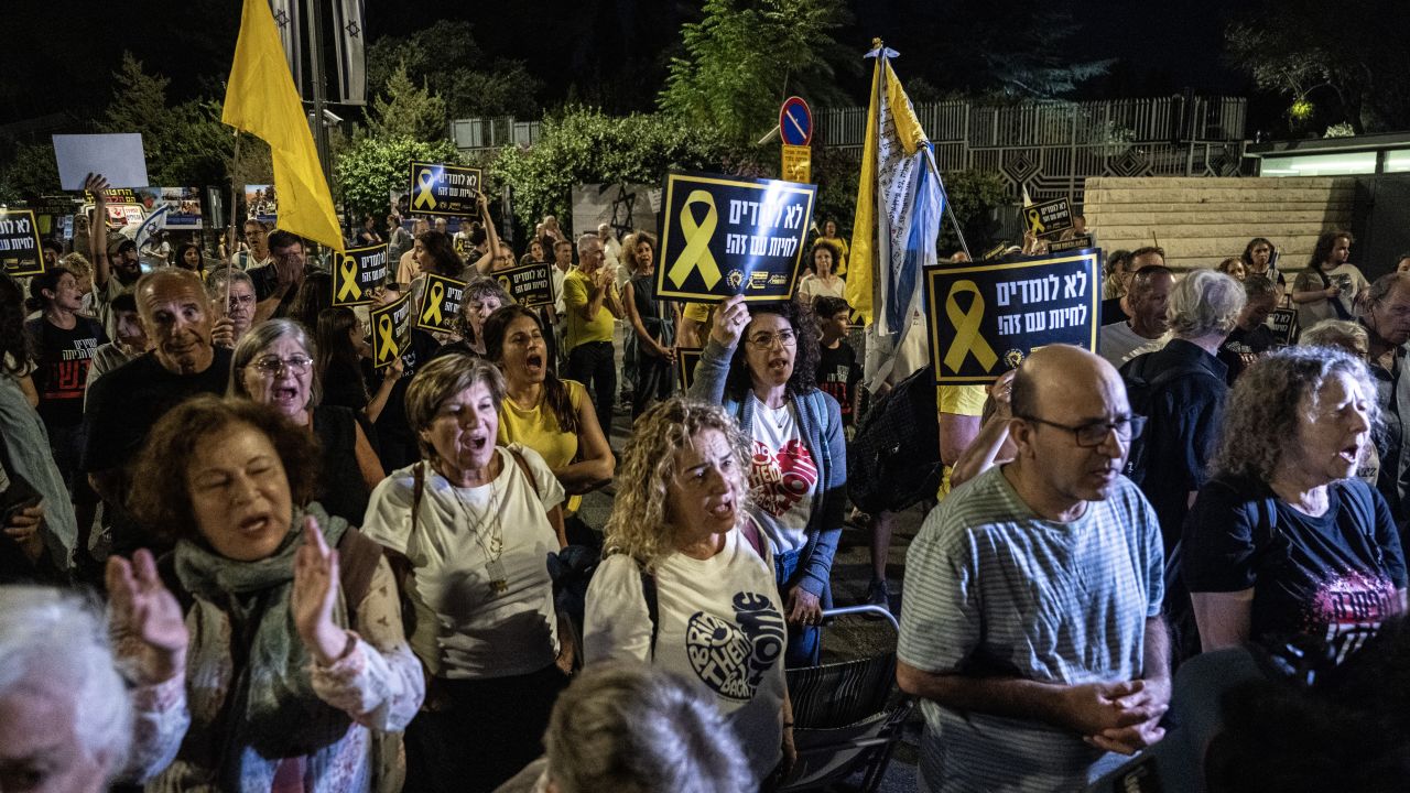 Protesters gather in front of the residence of President of Israel Isaac Herzog, staging a demonstration to demand an end to the war and the return of Israeli hostages, in West Jerusalem on September 4, 2025.