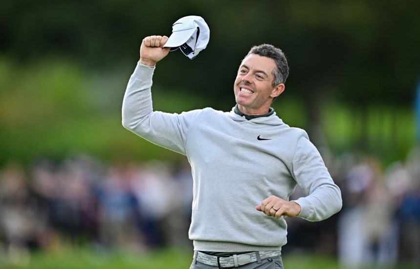 McIlroy celebrates winning the Irish Open over Joakim Lagergren.
